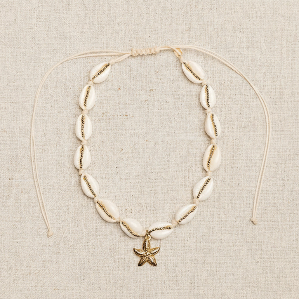 Necklace with starfish pendant on a light beige background
