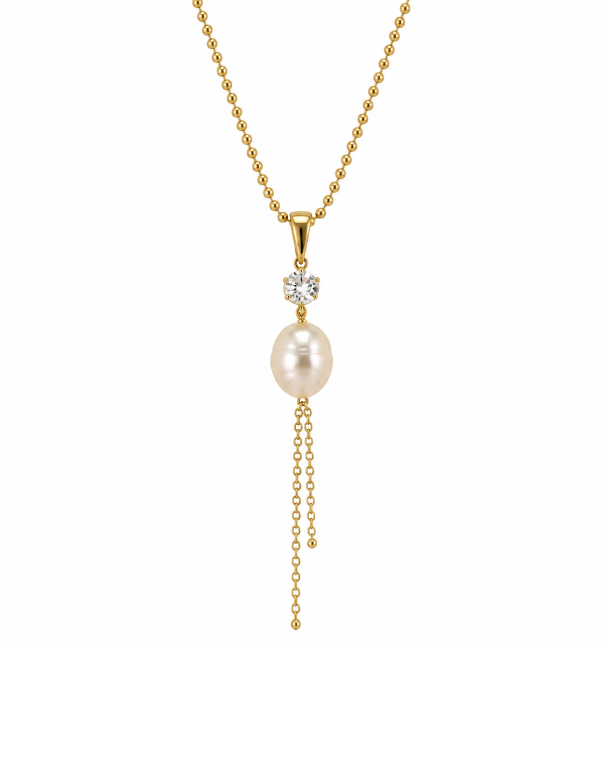 A gold chain necklace featuring a large white pearl pendant, a small diamond-like floral accent, and two dangling chain tails, shown on a plain white background.