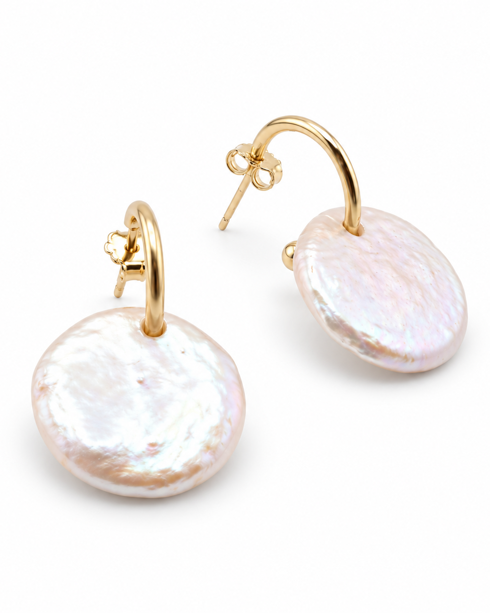 A pair of gold hoop earrings with large, irregular oval freshwater pearl drops, displayed on a clean white background.