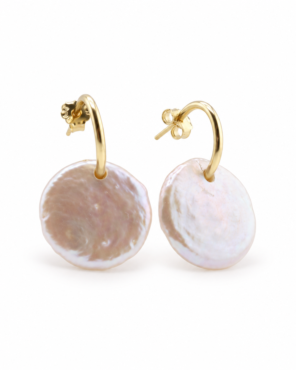 A pair of gold hoop earrings with irregular, disc-shaped freshwater pearl drops on a clean white background.