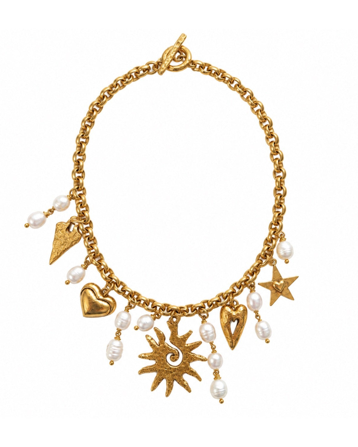 Discover the Solimar Pearl Charm Necklace with freshwater pearls, antiqued 18k gold-plated vintage brass, and a toggle clasp. Handmade in Florida.