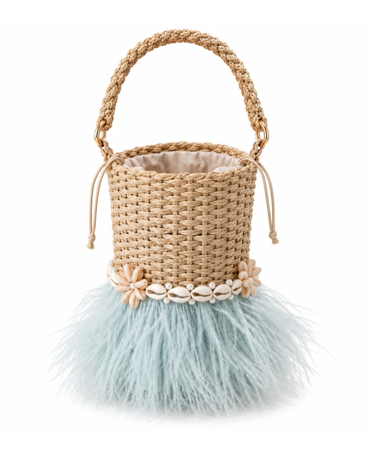 A woven straw bucket bag with a braided top handle, a band of cowrie shells and floral accents, and a fluffy pale blue feather skirt, shown on a white background.