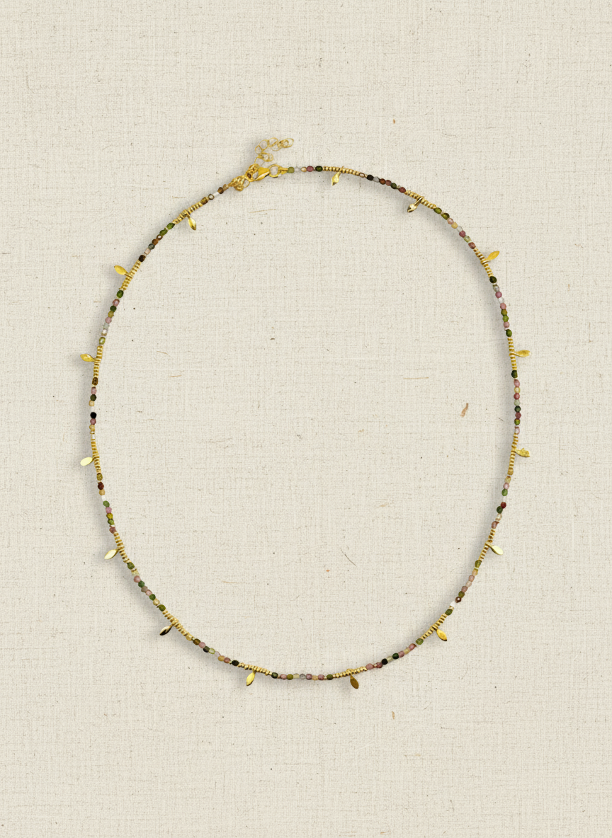 Necklace with small beads on a white background