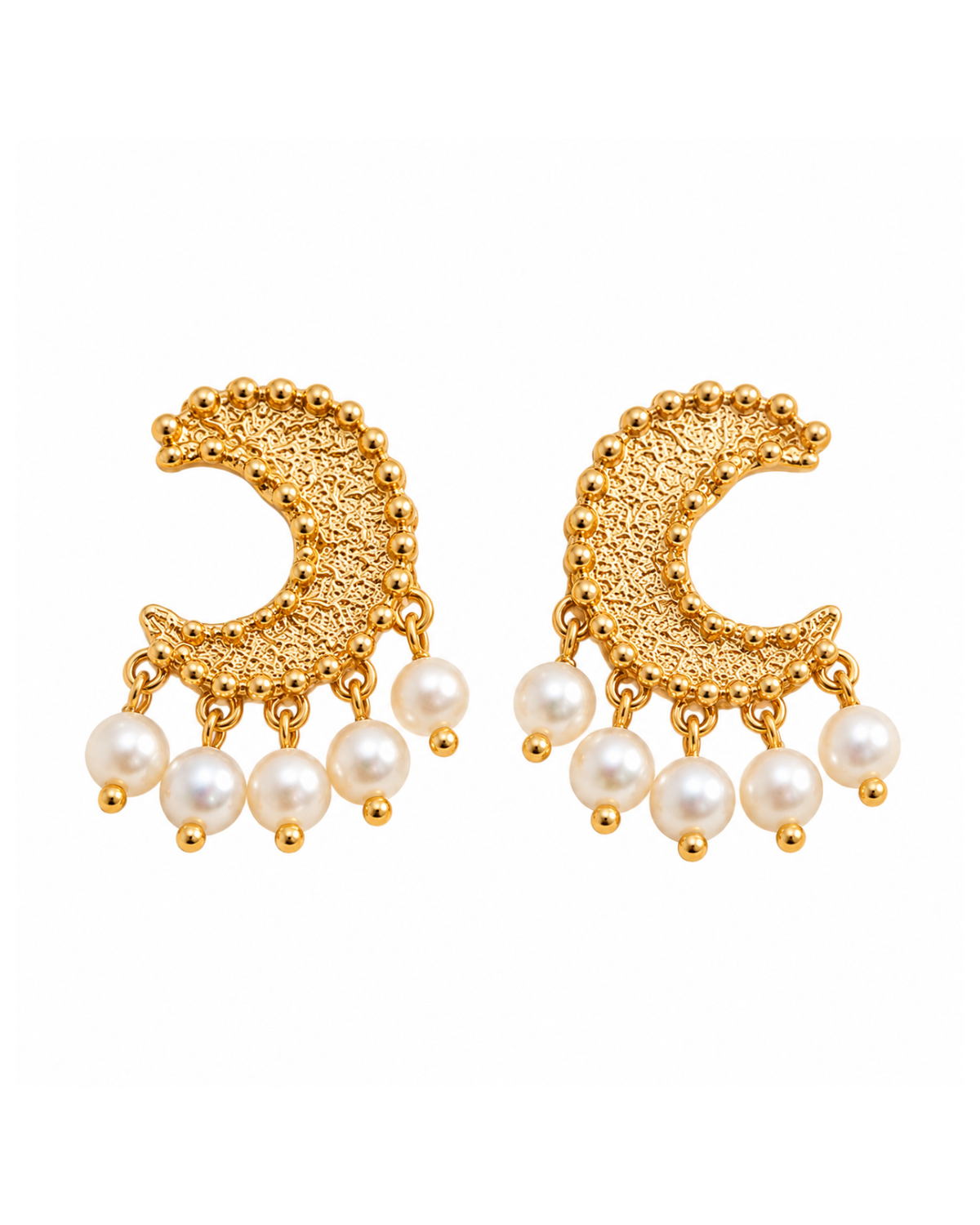 A pair of gold crescent-shaped dangle earrings with textured metal tops and hanging white pearl drops, shown on a plain white background.