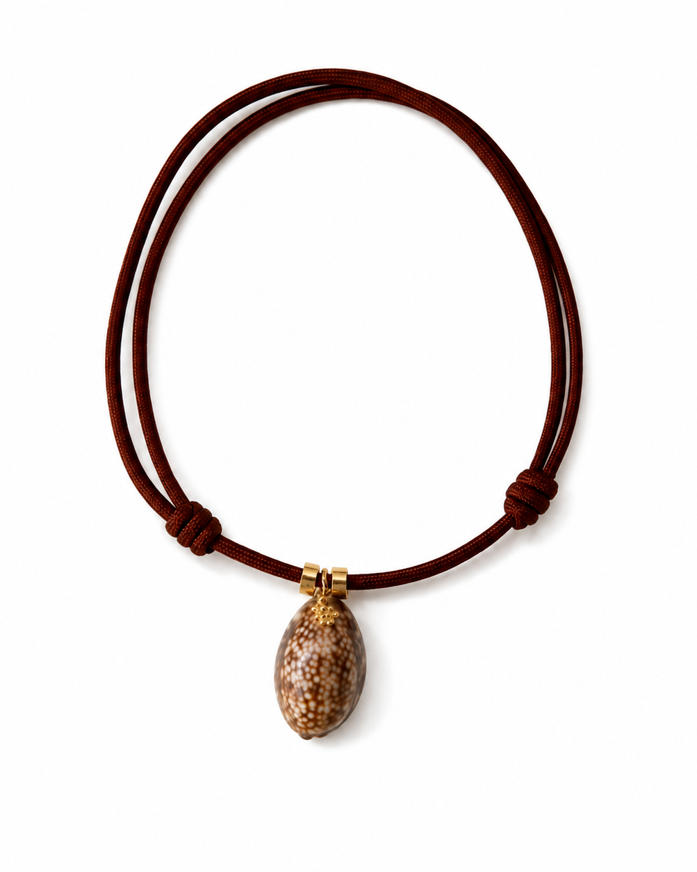 Brown cord necklace with a textured pendant on a white background