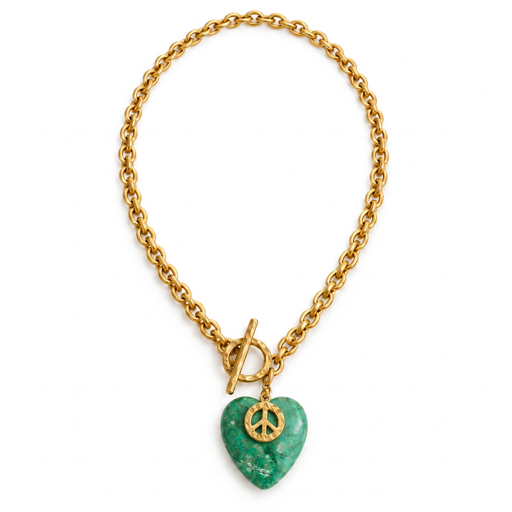 Harmony Heart Necklace with green chrysocolla heart and gold peace charm on a white background